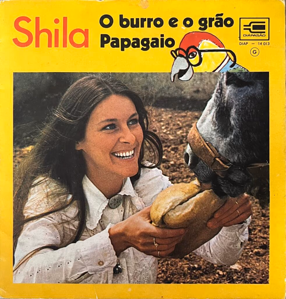 Shila: O Burro e o grao / Papagaio